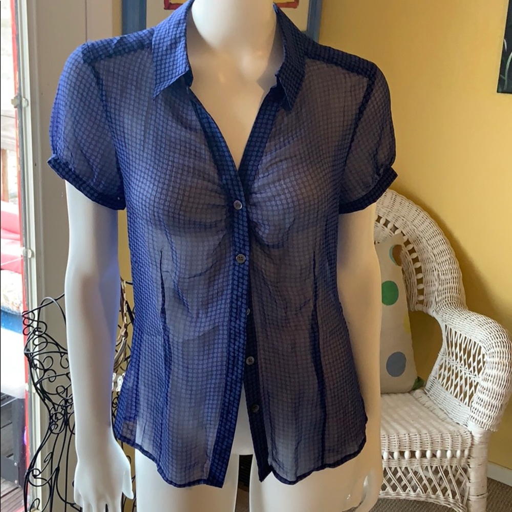 The limited sz. med.sheer button up! Fits small